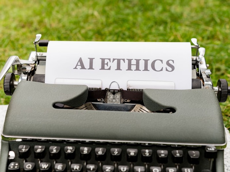 a close up of a typewriter with a paper on it