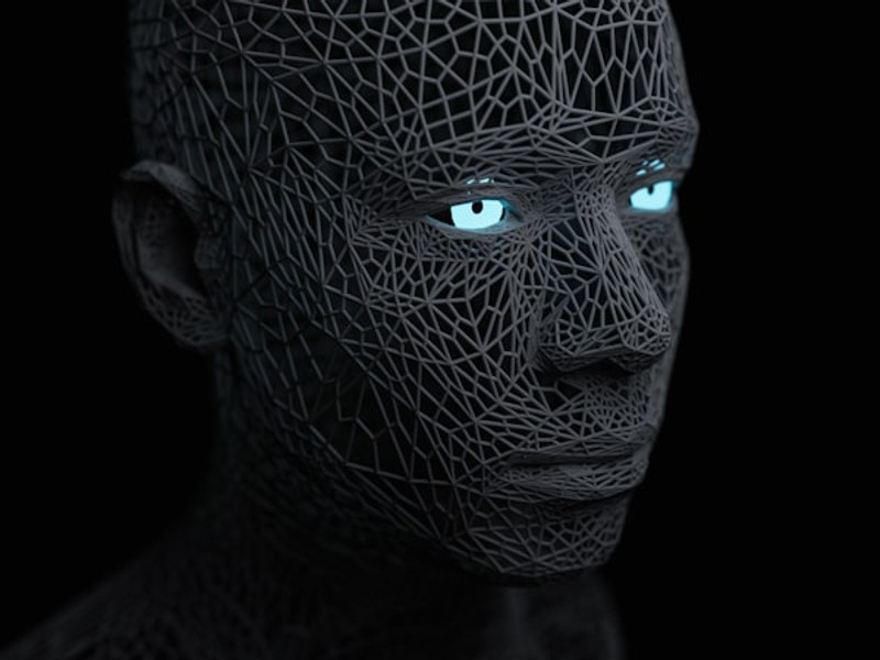 a man with blue eyes and a black background